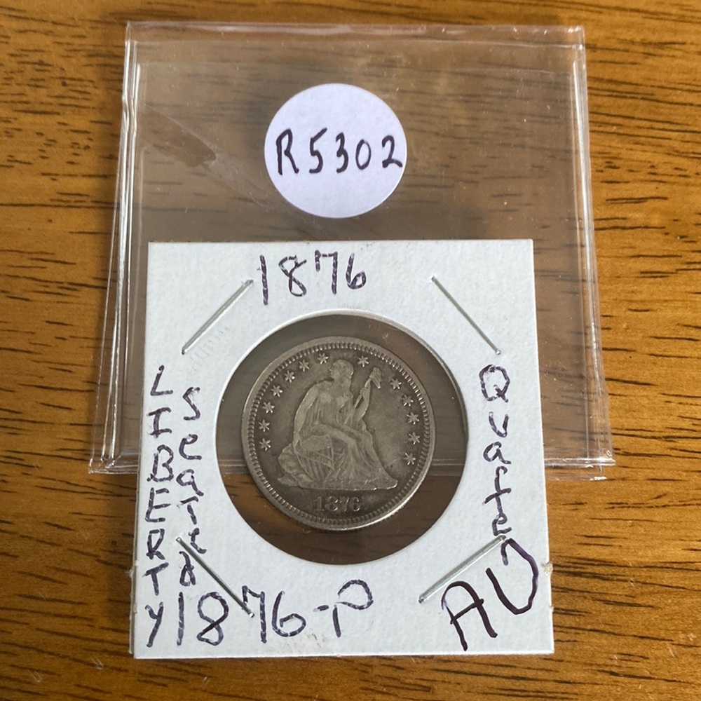 1876-P Liberty seated quarter of a dollar “AU” condition details are great.
